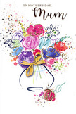 A vivid watercolour bouquet rendered with the warmth of a hand-tied posy-each stroke feels like a breath of spring. Deep indigo lines trace the edges of petals, giving structure to swathes of hot pink and cerise blooms that tumble into softer apricot and chartreuse accents. Magenta roses sit amid gentle lavender and powder-blue flowers, the cool tones offering a calming counterpoint to the more exuberant pinks and radiant reds. Flecks of paint and tiny heart motifs scatter around the composition like confetti, suggesting laughter and celebration as if petals were lifted on a warm Mayfair breeze. Delicate gold detailing catches imagined light: thin, shimmering lines that define veins and petal folds and a neat golden bow that crowns the vase. The vase itself is softly ribbon-wrapped, its curves grounding the painterly movement and hinting at the tactile crinkle of satin. Soft morning light seems to fall across the scene, making the gold gleam and the watercolour washes glow with translucent depth. A subtle suggestion of scent-dew-wet petals, gentle rose and freesia-lives in the description, as though the card were perfumed by the bouquet it depicts. The composition balances spontaneity and intention, a floral sketch that reads like a cherished note of thanks. Perfect for Mother's Day or a quiet celebration of care, the illustration feels like a tangible hug delivered from a neighbourhood florist who knows the rhythms of a city garden.